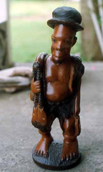 Photo of carving of fisherman