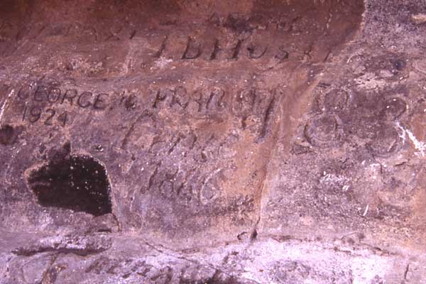 Photo of names carved in rock